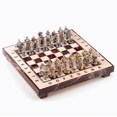 Серебряные шахматы «Борьба добра со злом»