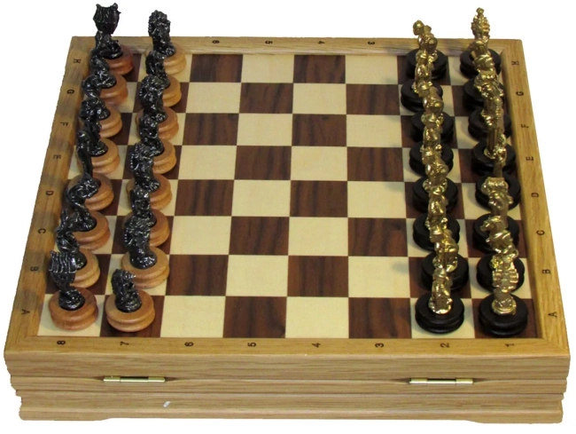 Шахматы "Сказочные" цинковый сплав/черненые на доске из массива дуба 32 см